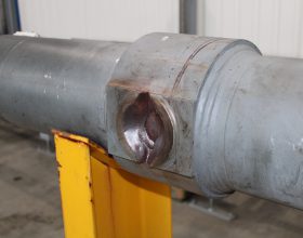 before - demolished trunnion pin of hydraulical cylinder