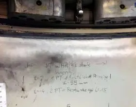 non-destructive testing (ultrasound and dye penetrant inspection) of cracked weld seam of tower flange